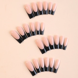 Long coffin-style French press-on nails in nude pink with glossy black tips 24pcs