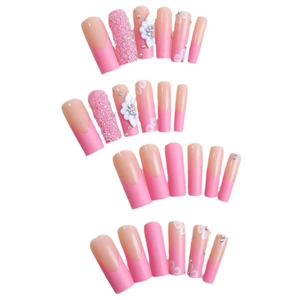 Pink and nude gradient coffin press-on nails with 3D white flowers and glitter French tips