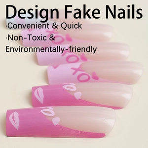 Extra long French press-on nails in pink with XOXO and lip prints for Valentine's Day
