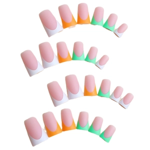 Matte press-on nails set with colorful French tips in white, orange, and emerald green