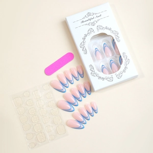 Blue French stripe almond press-on nail kit with pink file and adhesive in gift box