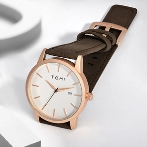 Minimalist TOMI quartz watch with rose gold case, date window and brown leather strap