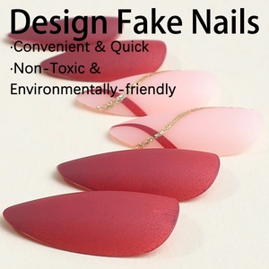 Luxurious almond-shaped press-on nails in deep red matte and sheer pink with gold glitter lines