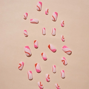 French press-on nails with pink and orange abstract wave patterns in multiple sizes