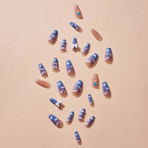 Long trapezoid press-on nails with blue-purple gradient, 3D bows, and heart charms