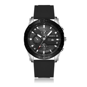 Detailed macro view of black dial chronograph watch with silver bezel and rubber strap