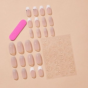 French tip press-on nails set with nude base and rhinestones, short trapezoid shape