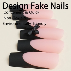 Matte black and pink French press-on nails with 3D bow decoration and long coffin shape