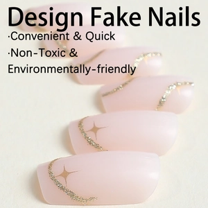Chic nude pink press-on nails with golden glitter waves and starburst patterns