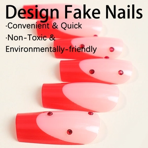 French tip press-on nails with red and pink ombre design and small rhinestone accents