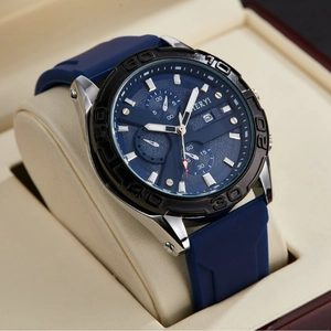 Men's sports watch with deep blue dial, chronograph sub-dials, and blue silicone strap