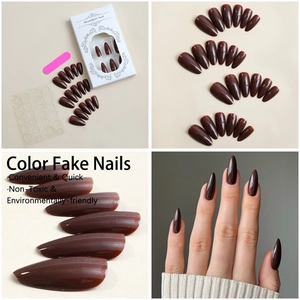Detail view of dark brown stiletto press-on nails set with packaging and accessories