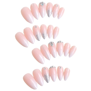 Ombre pink and white almond press-on nails with silver glitter and rhinestone accents
