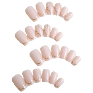 Luxurious pink press-on nails set with gold wave texture and sparkling stars