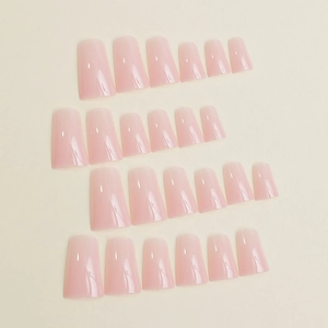 Translucent jelly pink press-on nails set in coffin shape with glossy finish