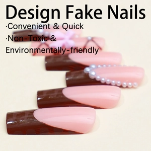 Long french chocolate press-on nails with pink 3D bows and white pearl accents