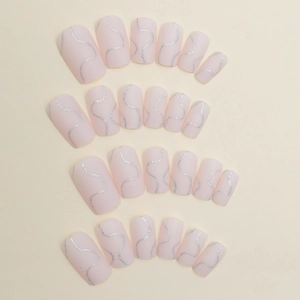 Matte light pink press-on nails with silver glitter marble waves for women