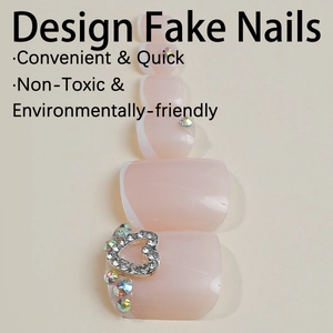 French tip press-on toe nails with rhinestone heart design and translucent pink finish