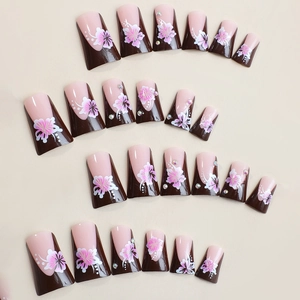 French floral press-on nails with duckbill shape and rhinestone accents on 24pcs set