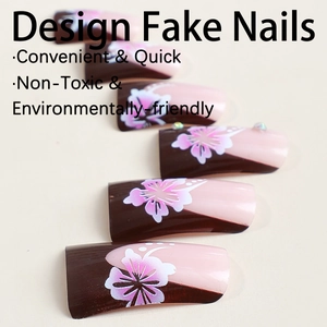 French duckbill fake nails with purple floral print and small rhinestone accents