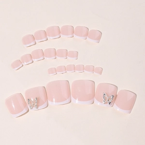 French style toe press-on nails with pink base, white tips and silver butterfly decor