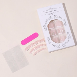 Detail of French style false toenails with 3D silver butterflies and adhesive tabs