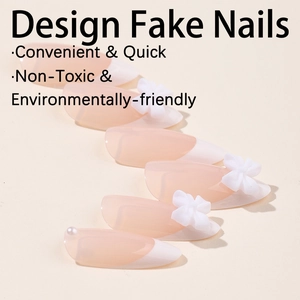 French tip press-on nails with 3D white flowers and pearls on nude pink base