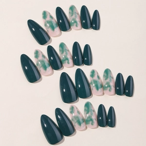 Almond-shaped press-on nails with dark green and light marble pattern glossy finish