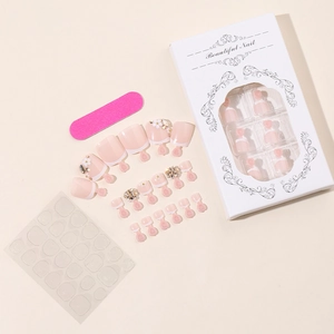 French tip toe press-on nails with 3D white flowers, gems, and nail glue application kit