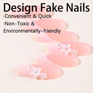 Pink gradient long press-on nails with 3D white flower design and silver beads