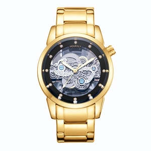 Montre squelette dorée pour homme avec mécanisme apparent et bracelet en acier