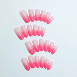 Set of 24 pink and white ombre coffin press-on nails with a glossy polished finish