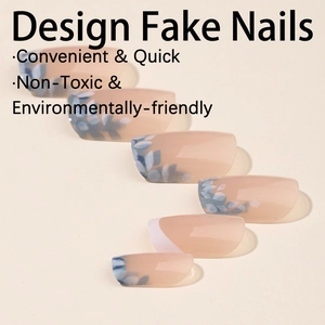 French retro nude pink press-on nails with blue and white botanical floral print patterns