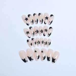 French almond fake nails with black star patterns on nude base set of 24 pieces
