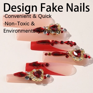 Long coffin fake nails with red heart rhinestones and gradient butterfly design
