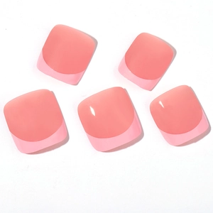 French tip coral pink press-on toe nails set with a glossy minimalist resin finish