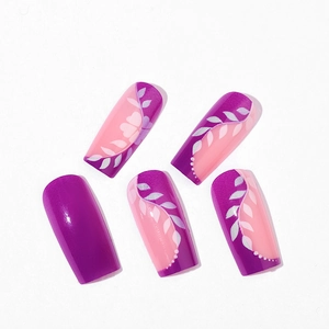 Purple and pink rectangle press-on nails with clover design and floral patterns