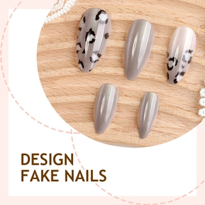 Cat eye fake nails set with leopard print and glitter gradient on light wood background