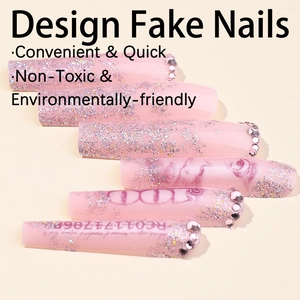 Extra-long light pink press-on nails with silver glitter, rhinestones and money art motifs