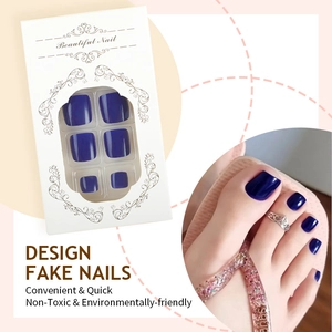 Deep blue press-on toe nails set in minimalist white window box packaging