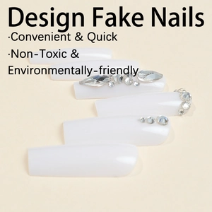 Extra long white press-on nails with diamond accents and minimalist glossy finish