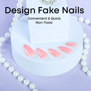 French white tip almond fake nails with silver glitter and soft pink base on pearl display