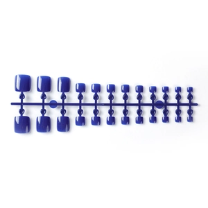 Set of 24 deep blue glossy press-on toenails for minimalist DIY pedicure beauty