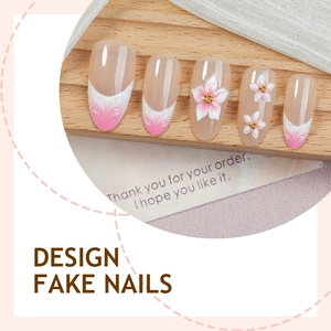 Detailed view of handmade 3D floral almond press-on nails with pink French gradient design
