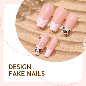 Pink French leopard print press-on nails with 3D bows and rhinestones in ballet style