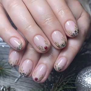 Short square Christmas press-on nails with mustard yellow and gold reindeer patterns