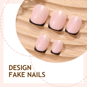 Short square press-on nails featuring a pink base with elegant black French tips