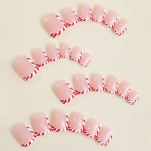 Christmas short press on nails with red and white candy cane french tips 24 pieces set