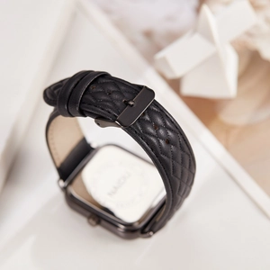 Rectangular quartz watch with black quilted leather strap and classic buckle detail
