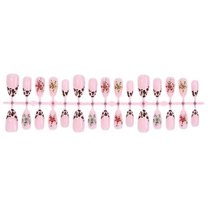 Almond-shaped pink leopard print press-on nails with 3D flower and bow decorations